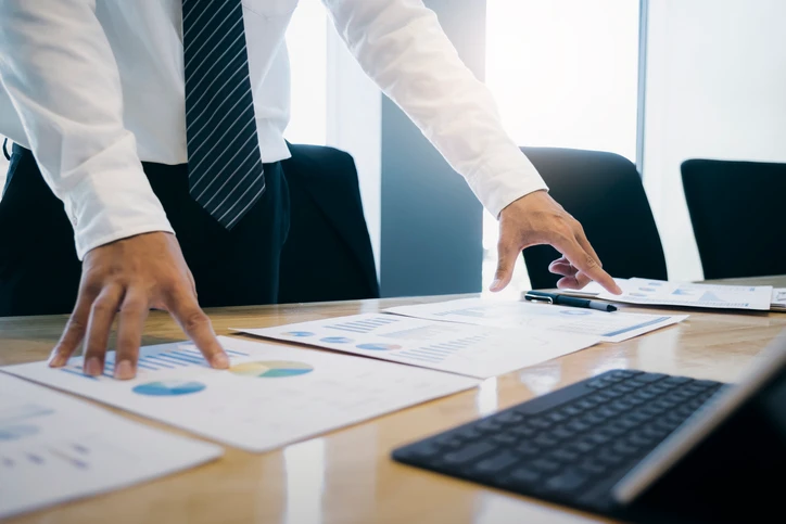 Businessman analyse investment marketing data.